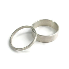 Load image into Gallery viewer, Thick and Thin Sterling Silver Wedding Set of 2 Bands - 2mm & 6 mm - Amalia Moon