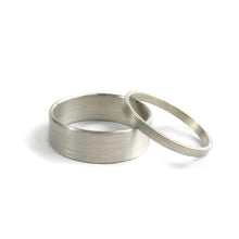 Load image into Gallery viewer, Thick and Thin Sterling Silver Wedding Set of 2 Bands - 2mm &amp; 6 mm - Amalia Moon
